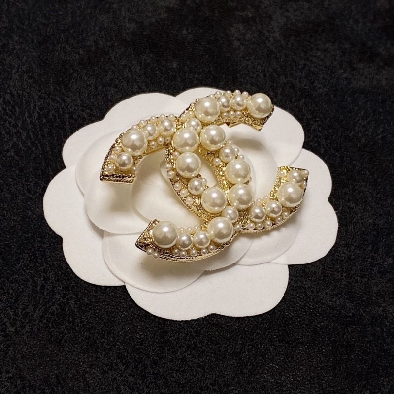 Ch*el brooches